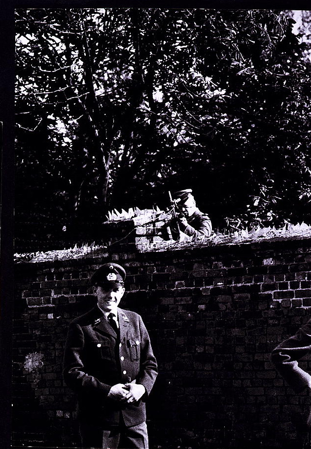 1961 photograph of the Berlin Wall dividing streets and buildings