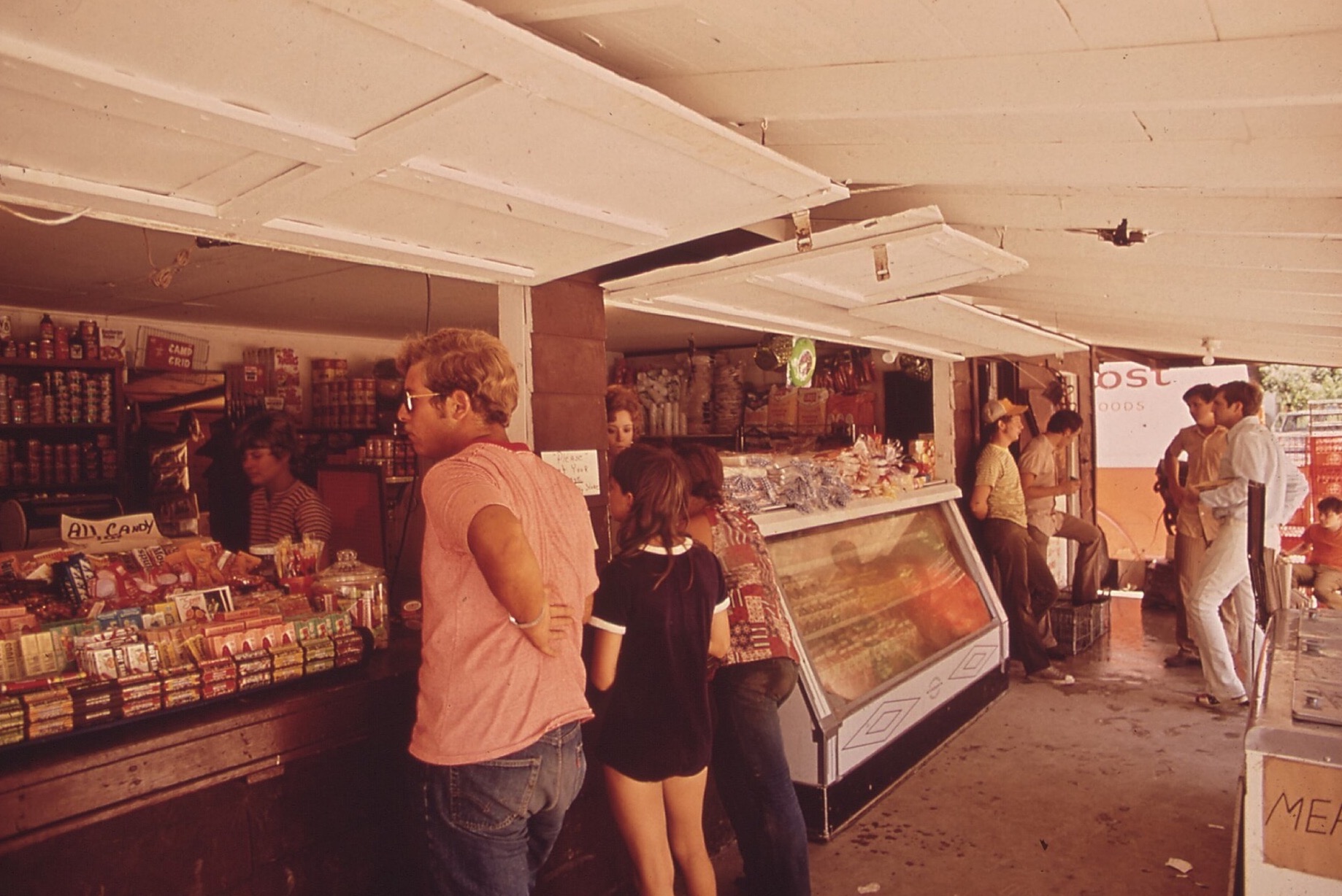 Shoppers choosing among groceries and other goods at a park store in Texas in 1972.