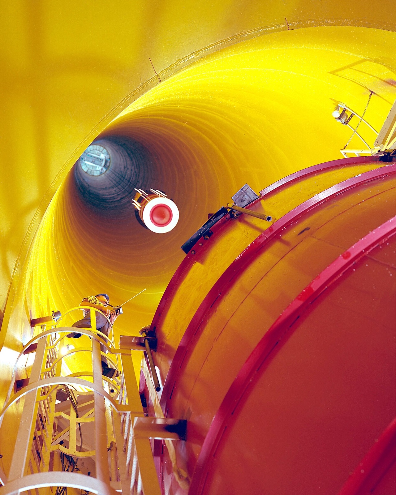 View upward through the tall cylindrical shaft of NASA’s Zero Gravity Facility.