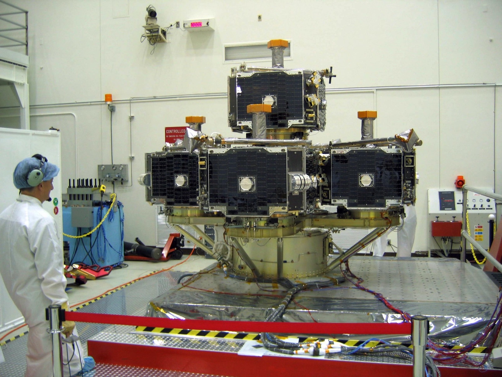 Five THEMIS spacecraft probes mounted together during a vibration test.