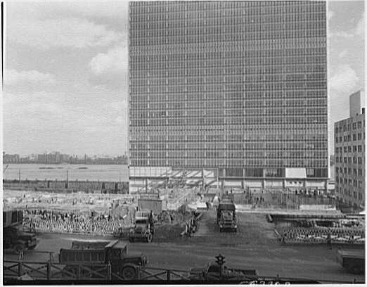 United Nations office tower rising behind an active construction site